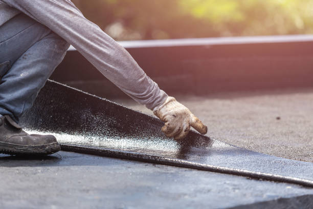 Professional Basement Waterproofing technician working in Cedarhurst, NY